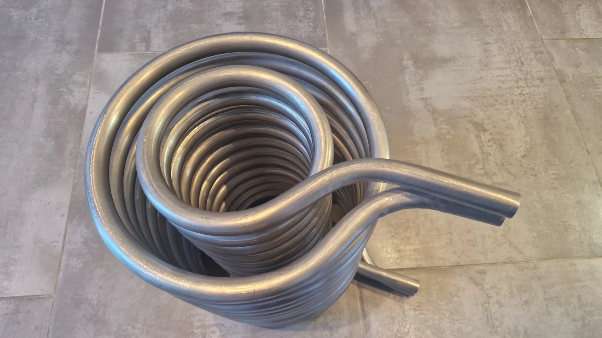 De dubbelgewonden warmtewisselaar is het hart van de Reveko boiler - beeld: Duklitech